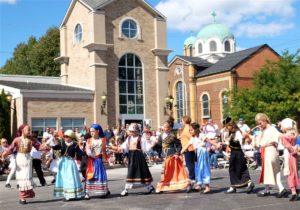 People dancing in a food festival